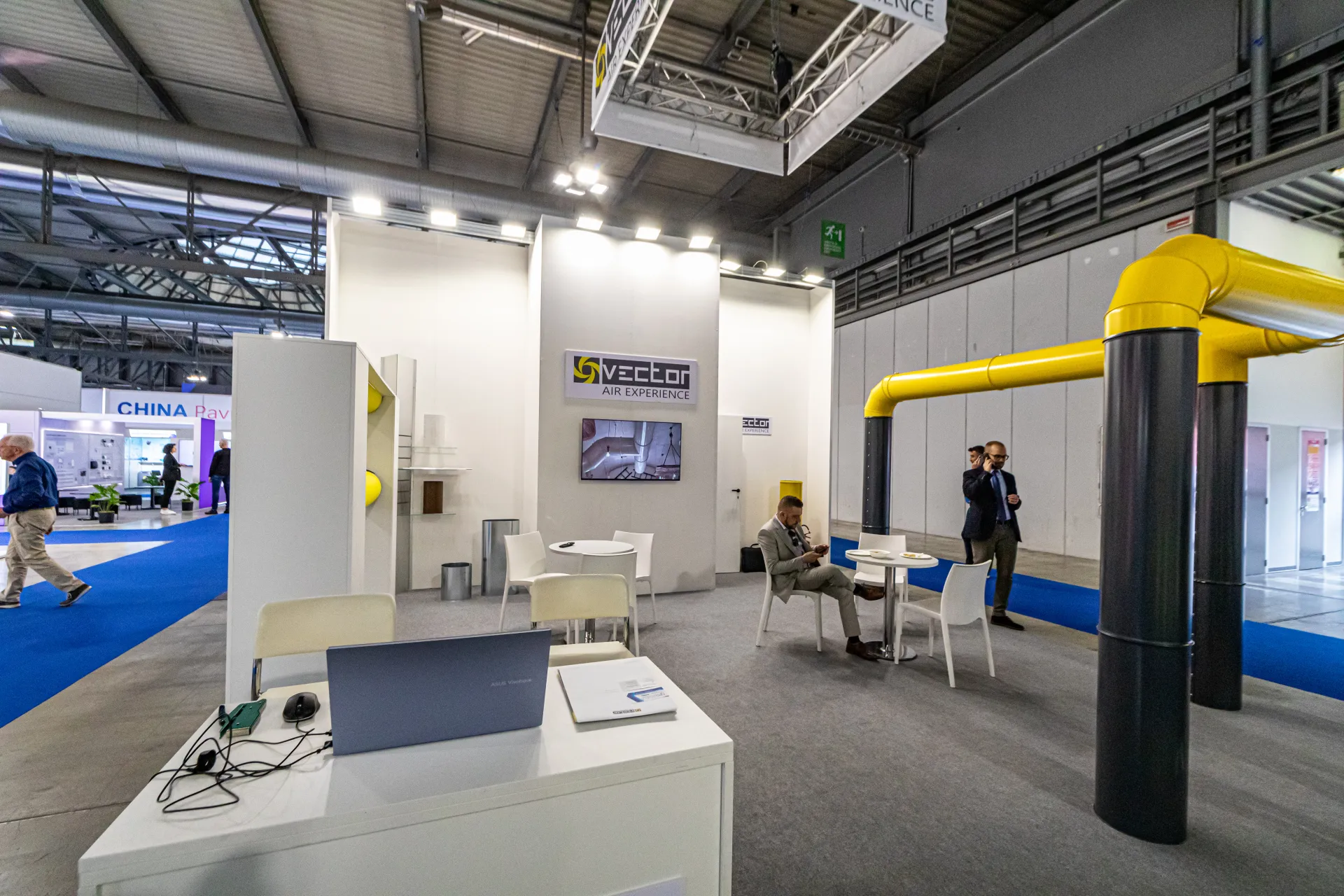 Vector stand with a yellow and grey duct installation at MCE 2024