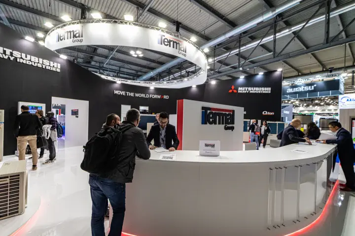 Visitors at the curved Termal Group reception counter at MCE 2024