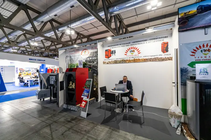Vismara biomass boilers on a shell-scheme stand with meeting table