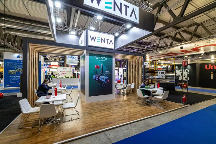 Wenta stand with wooden floor, slatted frame and thermal oil boiler poster
