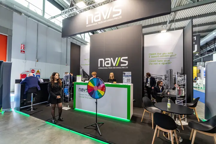 Wide view of the black Navis stand with meeting lounge at MCE 2024