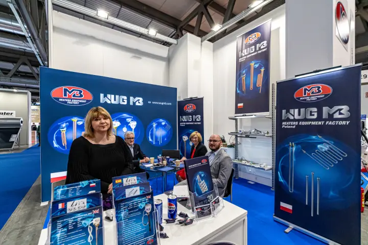 WUG MB heating elements and roll-up banners at a compact stand