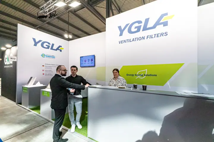 YGLA reception counter under the Energy Saving Solutions graphic