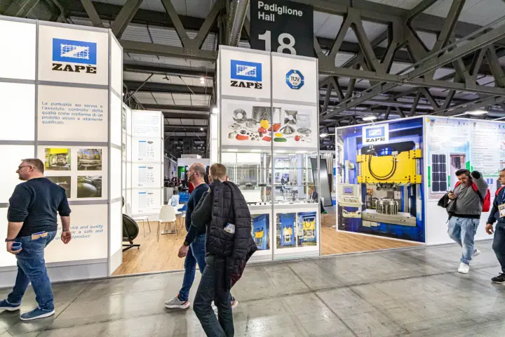Zapè stand with pressed metal components under the Hall 18 sign at MCE 2024