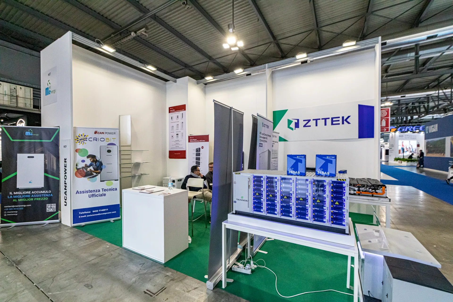 ZTTEK battery storage rack with LFP cells beside UCAN Power roll-ups at MCE 2024