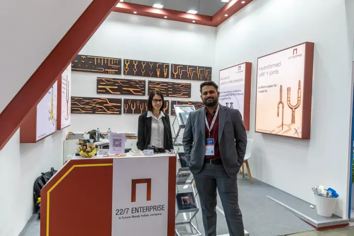 22/7 Enterprise stand with copper fitting boards and hydroformed VRF Y-joint posters at MCE 2026
