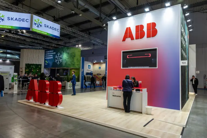 ABB stand with red freestanding letters and Welcome reception desk at MCE 2026