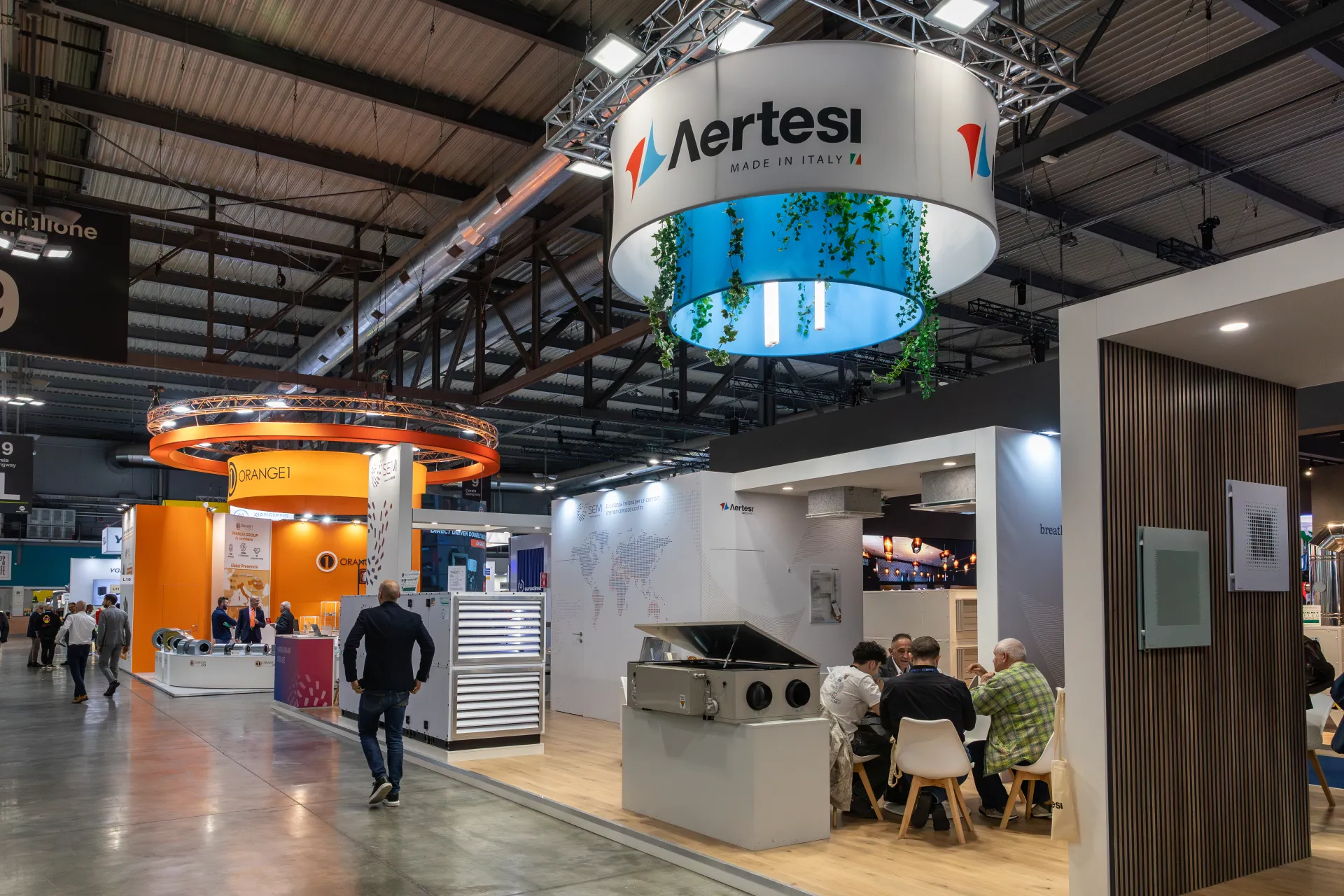 Aertesi stand with heat recovery unit and diffusers, SEM and Orange1 nearby at MCE 2026
