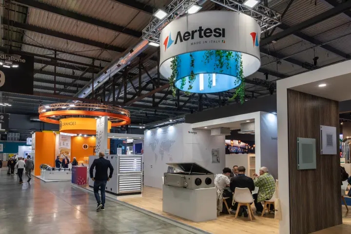 Aertesi stand with heat recovery unit and diffusers, SEM and Orange1 nearby at MCE 2026