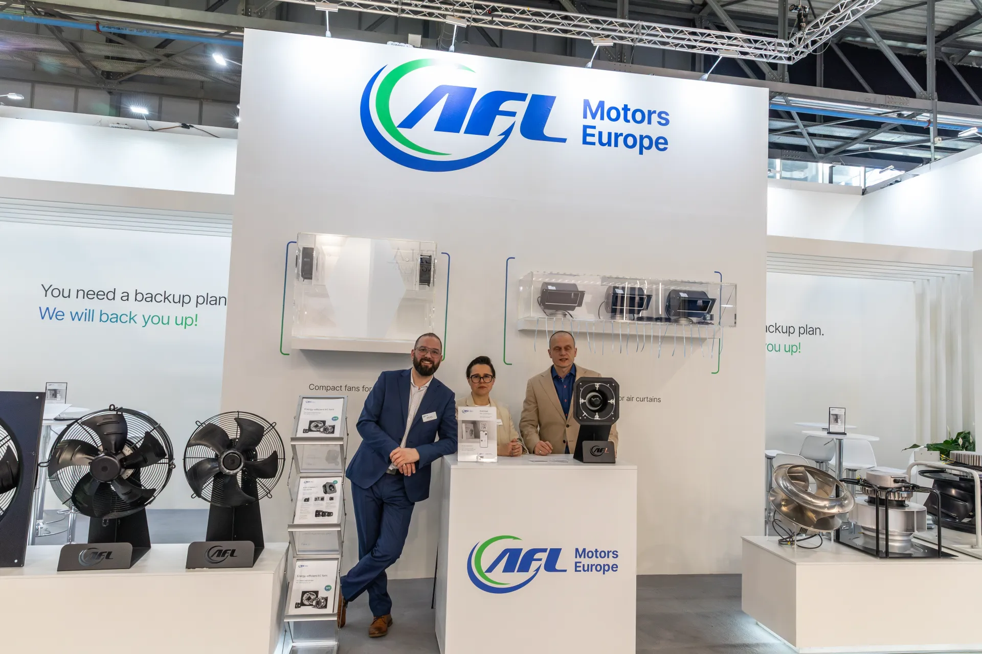 AFL Motors Europe stand front with axial fans and backward-curved impellers at MCE 2026