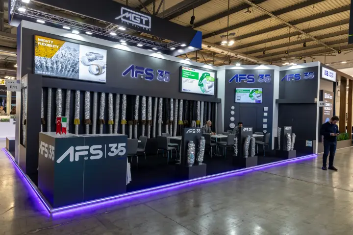 AFS stand lined with flexible aluminium ducts and round diffusers at MCE 2026