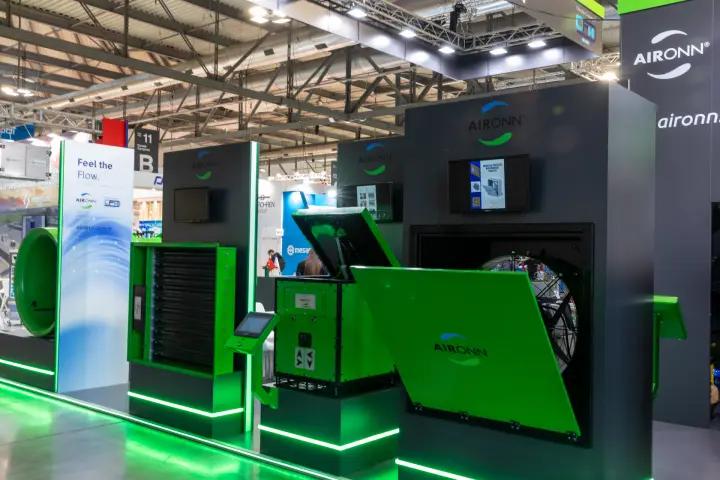 Aironn fan cabinets with open service lids and touchscreen kiosk