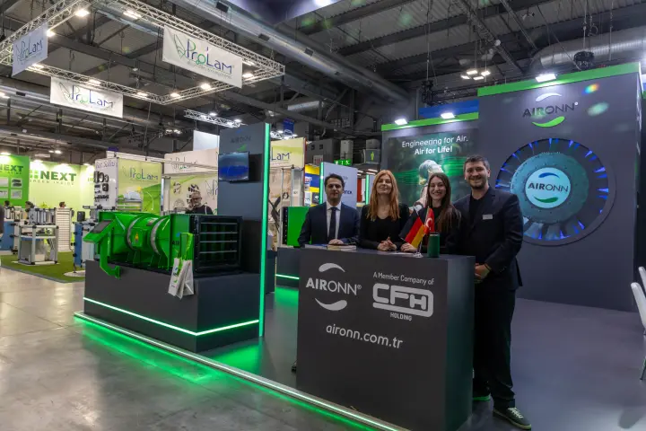 Aironn stand front with team, CFH Holding counter and green duct fan at MCE 2026