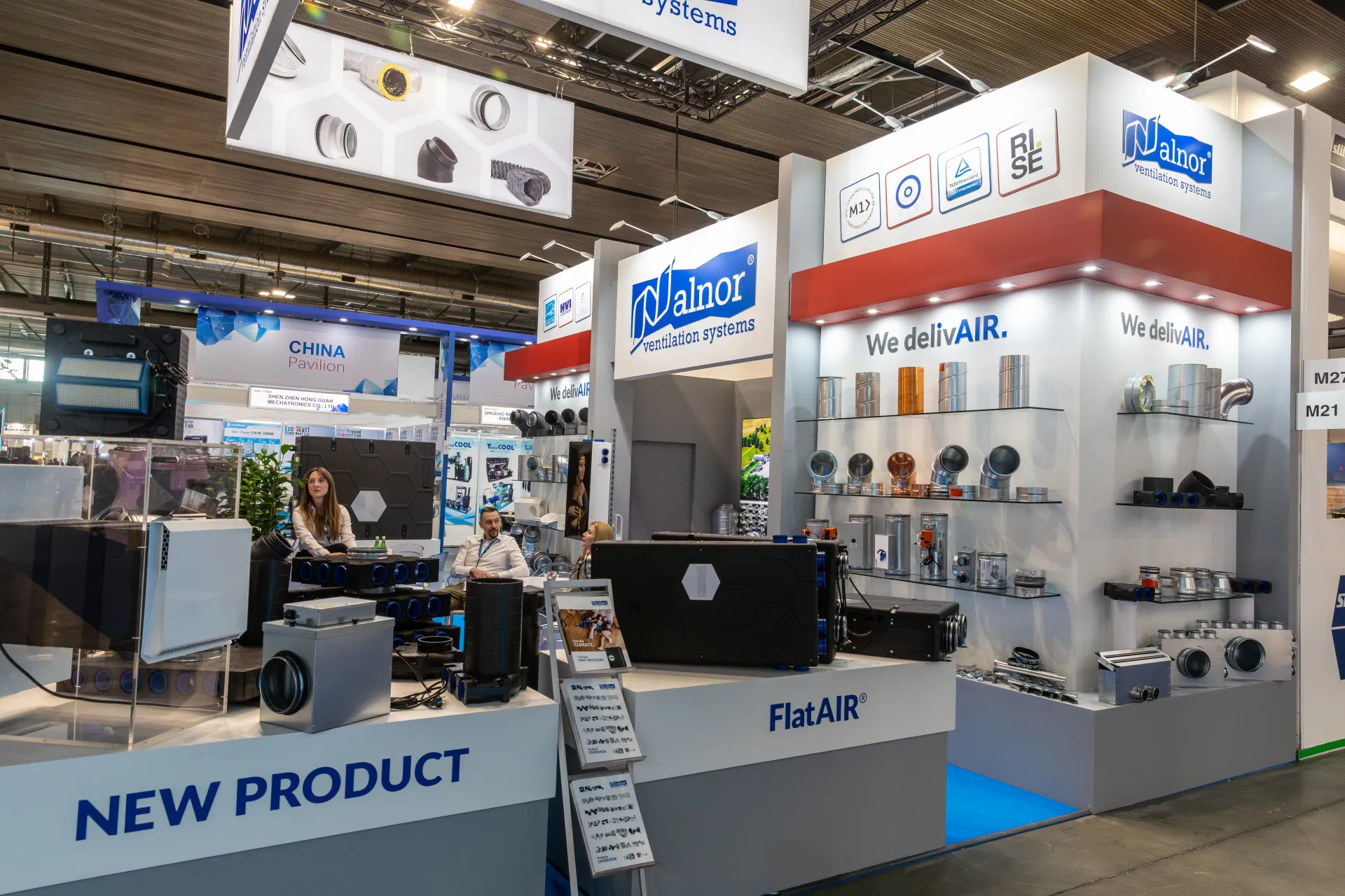 Alnor FlatAIR and new product counters beside duct fitting shelves at MCE 2026