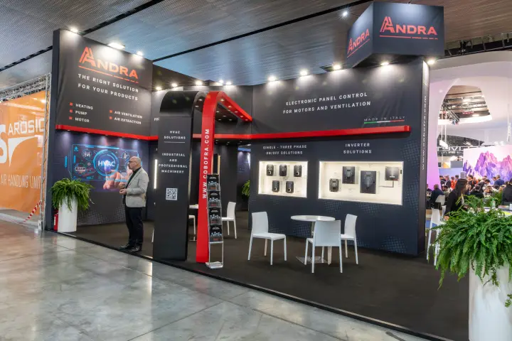 Andra stand with motor and ventilation control panels in lit niches at MCE 2026