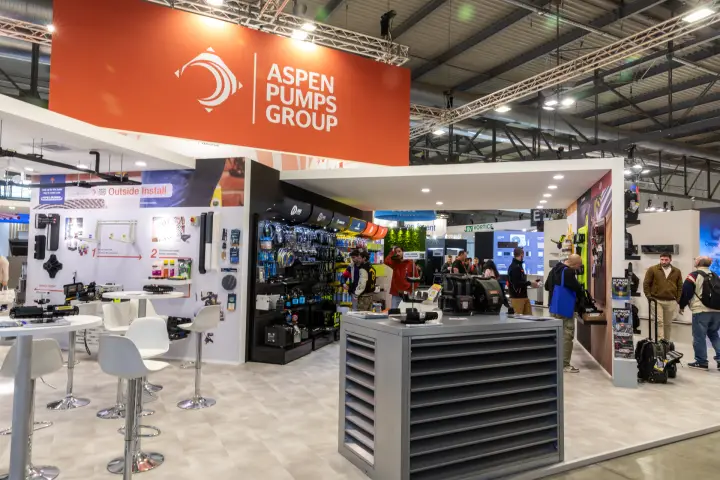Aspen Pumps Group stand with Outside Install wall and tool shelving