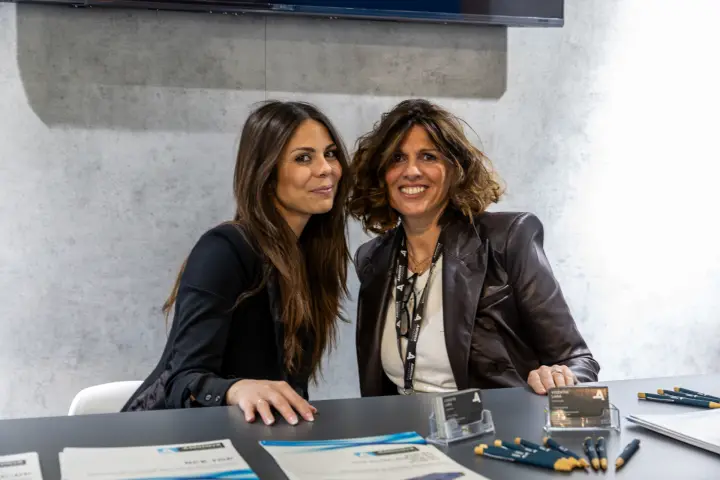 Aspirnova Industry team at the reception desk at MCE 2026