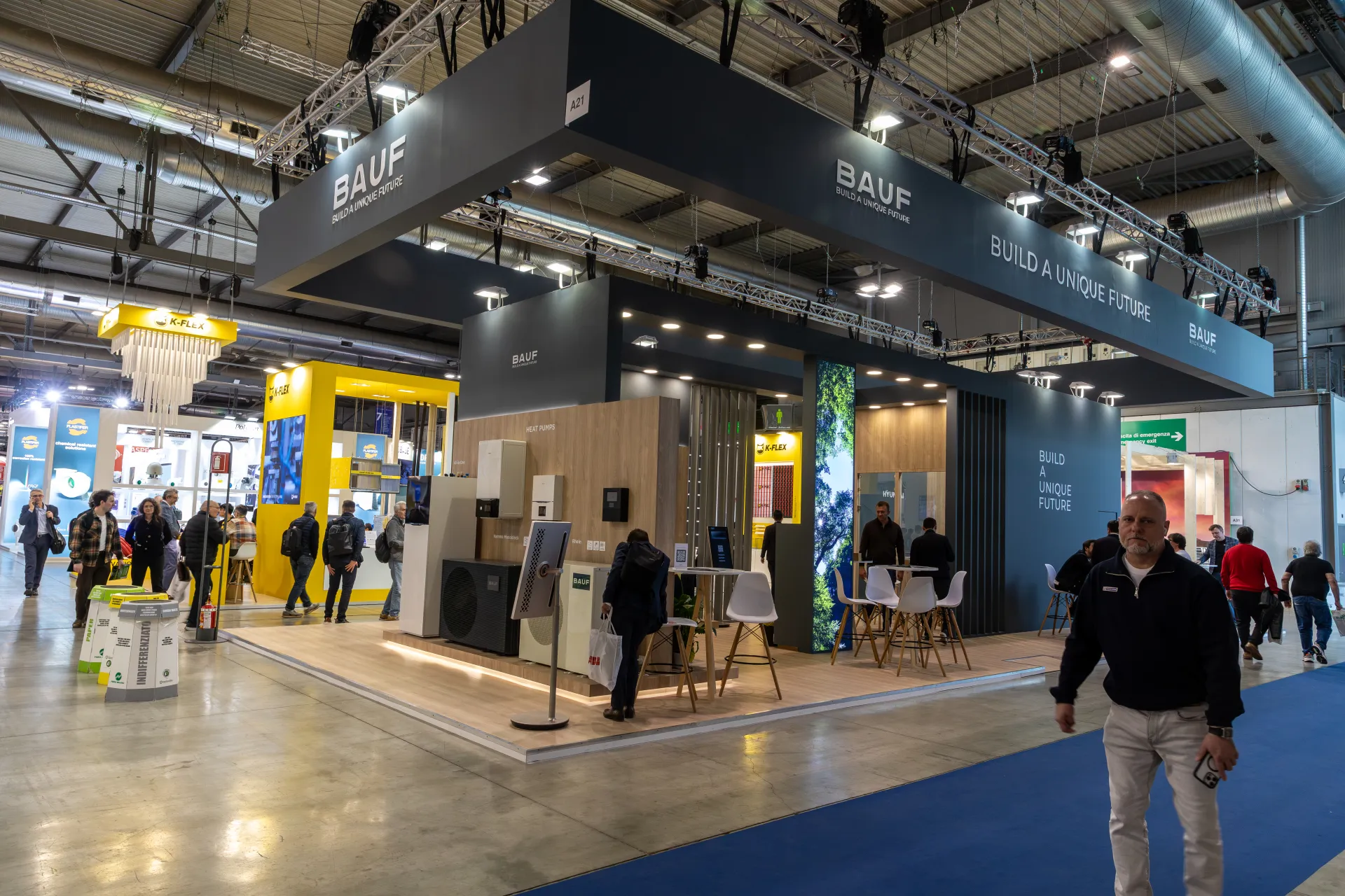 BAUF stand with heat pump wall under a dark 'Build a Unique Future' canopy at MCE 2026