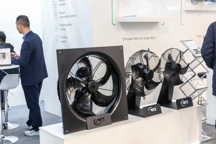 Black AFL axial fans with wire guards on branded display stands at MCE 2026