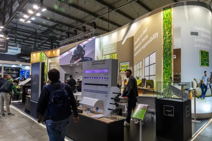 Brofer stand with linear slot diffuser wall and moss-lined graphics