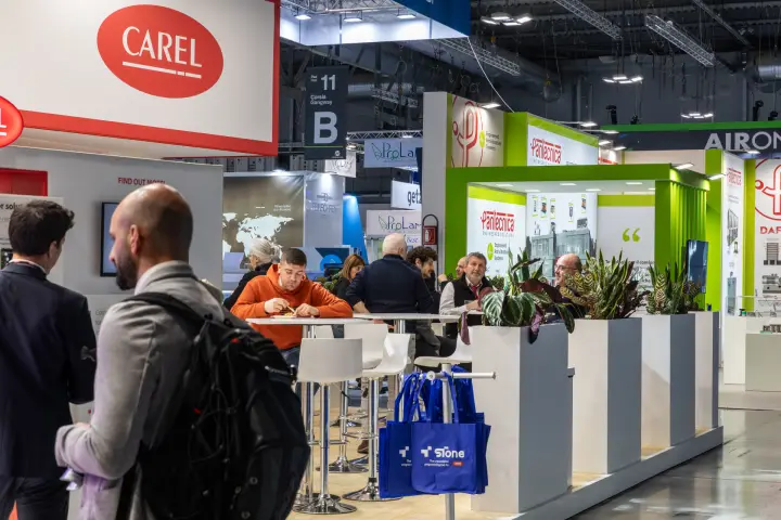 Carel lounge with high tables, planters and Stone bag rack at MCE 2026