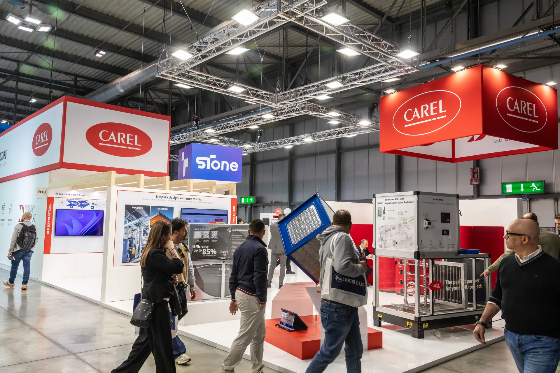 Carel stand with AHU control demonstrator and suspended Stone sign at MCE 2026