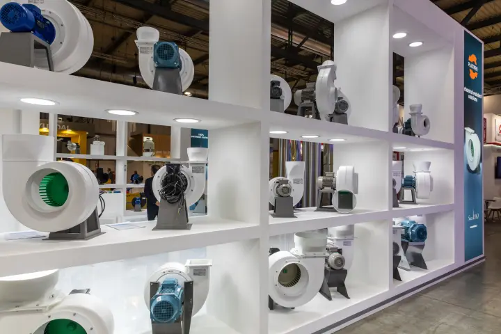 Close view of Plastifer white plastic centrifugal fans on lit shelves at MCE 2026