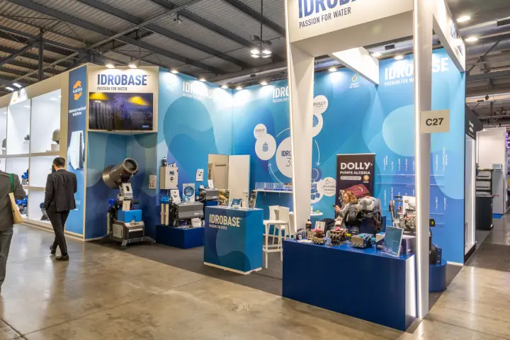 Corner view of the blue Idrobase stand C27 with pump displays at MCE 2026