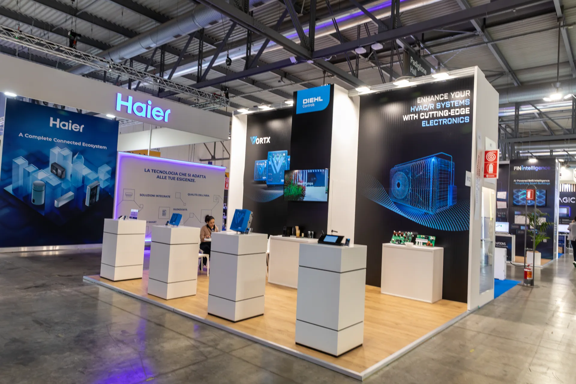 Diehl Controls corner stand with VORTX electronics beside the Haier stand at MCE 2026