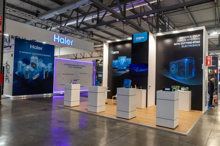 Diehl Controls stand with Vortx electronics on white plinths, Haier stand beside at MCE 2026
