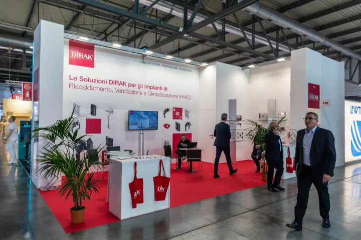 Dirak stand with HVAC enclosure hardware on red carpet at MCE 2026
