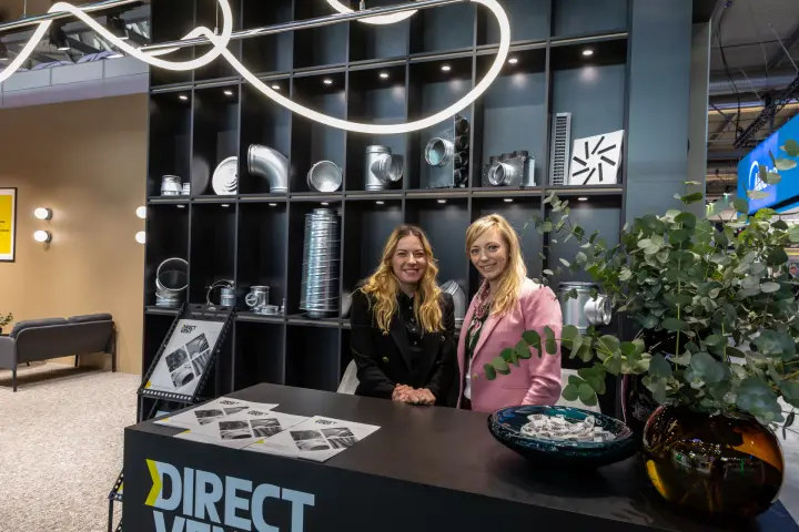 Direct Vent stand with duct fittings shelving and neon light sculpture