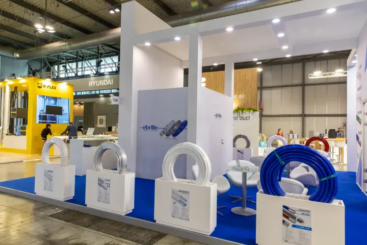 Ebrille Industries stand with coiled pre-insulated pipes on white plinths at MCE 2026