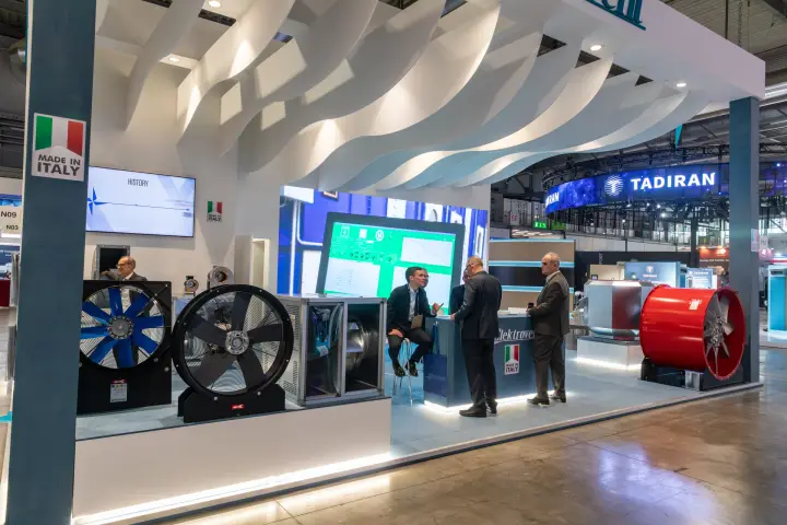 Elektrovent stand with axial and plenum fans under a wave-shaped ceiling