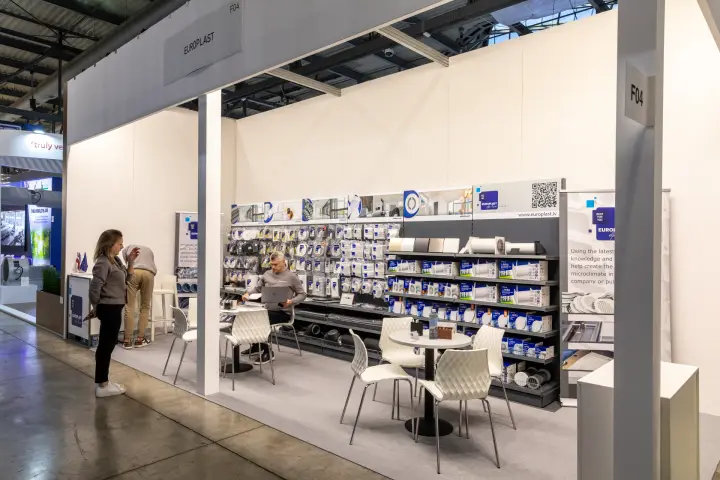 Europlast stand with ventilation grilles, extract fans and duct parts on shelving at MCE 2026