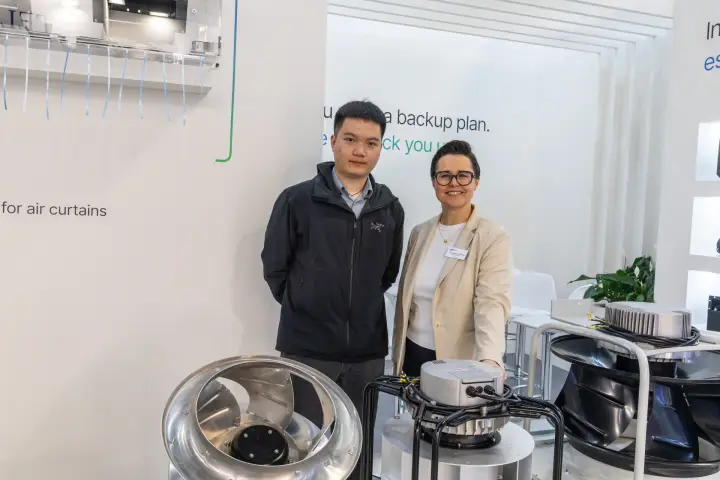Fan display with centrifugal impellers and an air curtain model at a white stand at MCE 2026