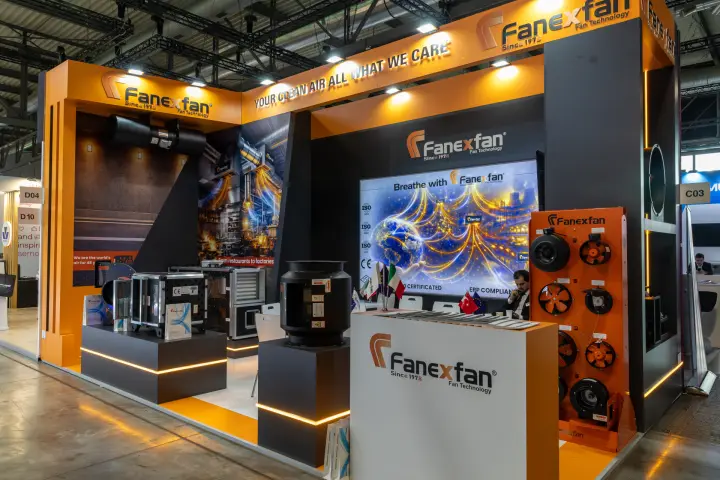 Fanexfan orange-and-black stand with fan board and 'Breathe with Fanexfan' graphic