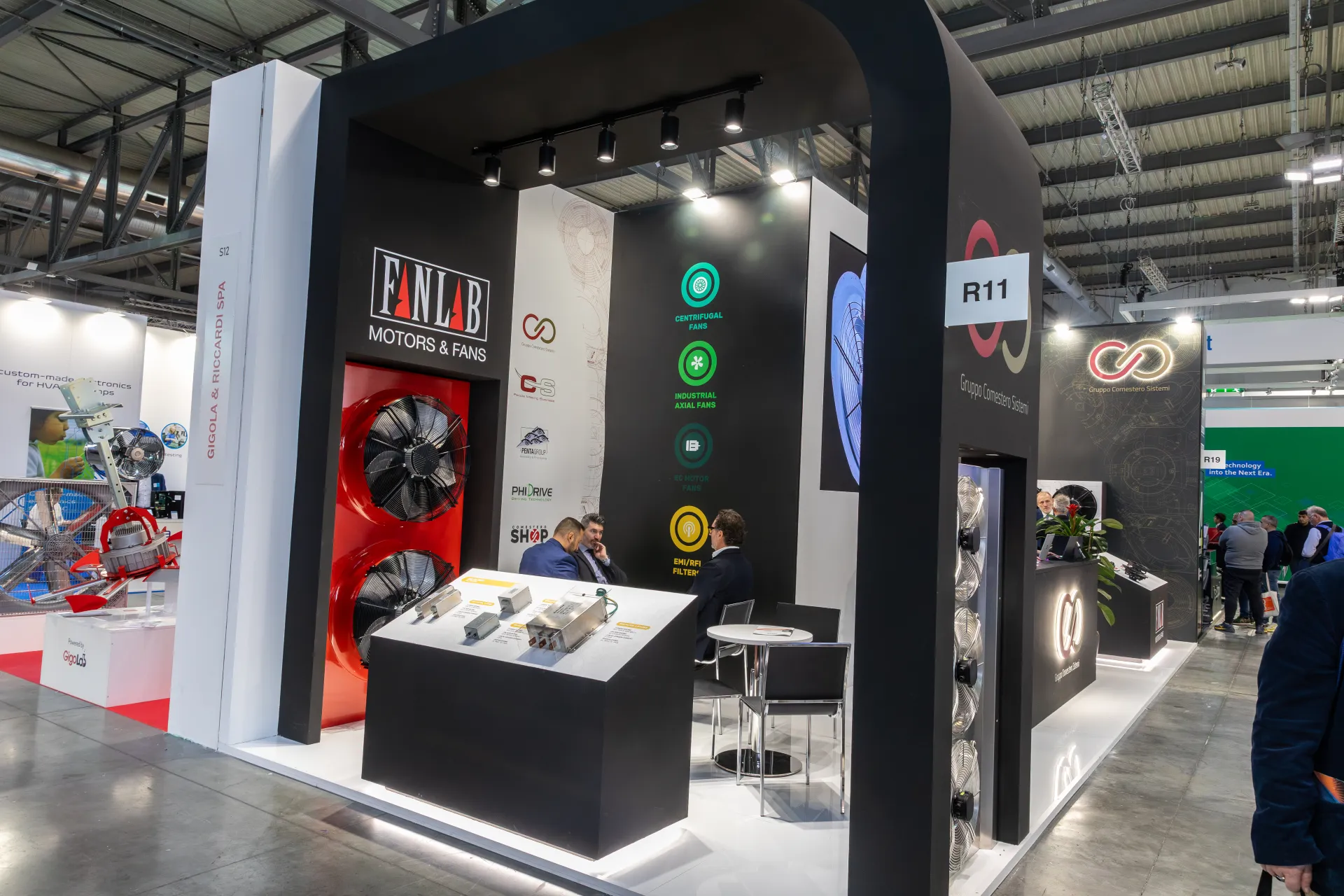 Fanlab Motors & Fans corner with EMI/RFI filters and a red fan panel at MCE 2026
