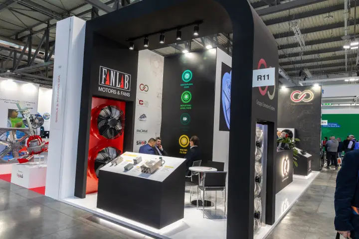 Fanlab Motors & Fans corner with EMI/RFI filters and a red fan panel at MCE 2026