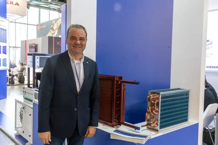 Gemak heat exchanger coils displayed beside a staff member at MCE 2026