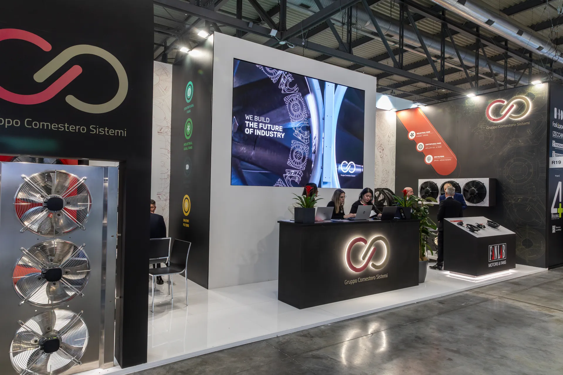 Gruppo Comestero Sistemi reception with 'We Build the Future' LED wall at MCE 2026