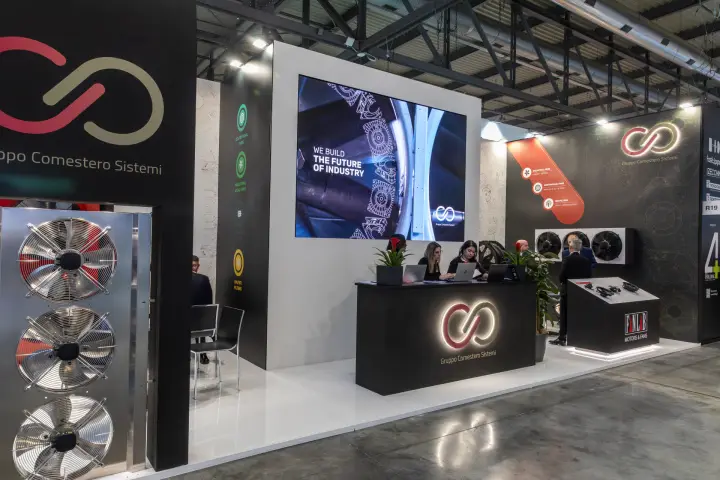 Gruppo Comestero Sistemi reception with 'We Build the Future' LED wall at MCE 2026