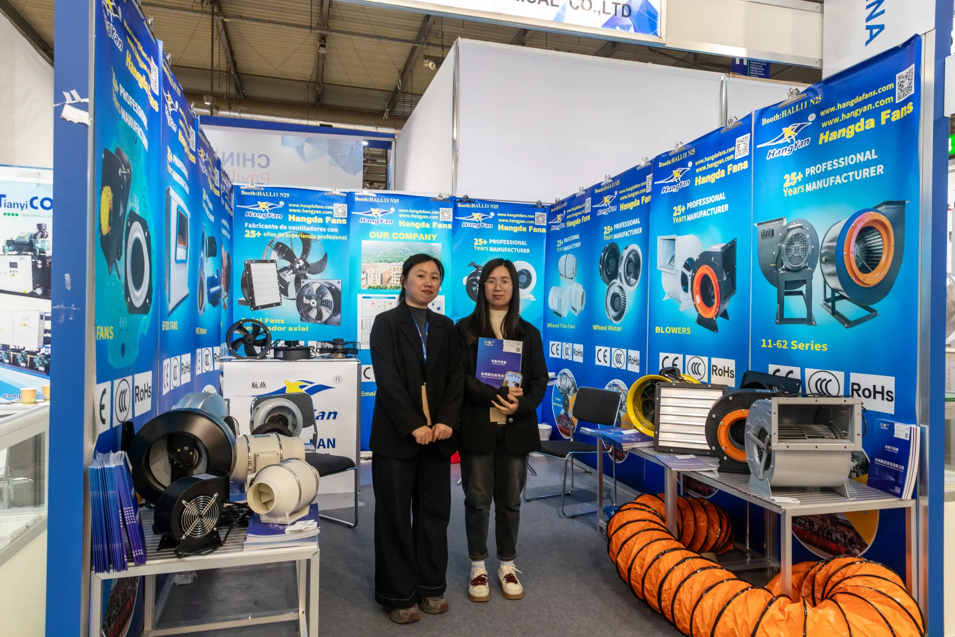 Hangda Fans booth with centrifugal blowers and orange flexible ducting at MCE 2026