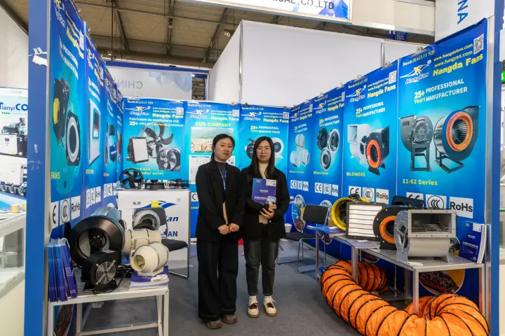 Hangda Fans booth with centrifugal blowers and orange flexible ducting at MCE 2026