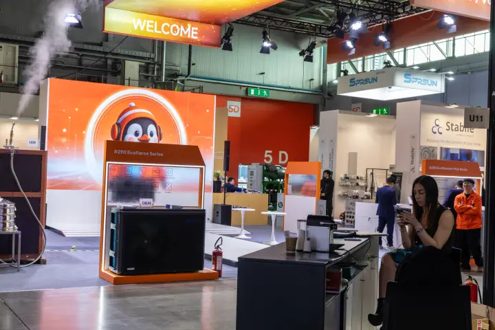 Hien R290 EcoForce heat pump below an orange 'Welcome' sign at MCE 2026