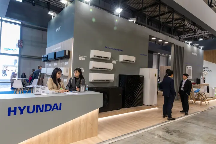 Hyundai stand with split air conditioners and black heat pump units at MCE 2026