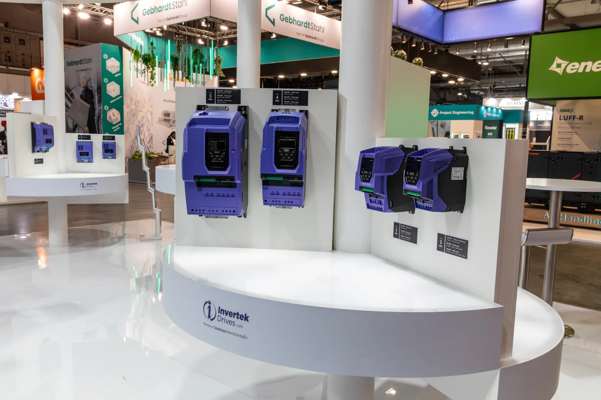 Invertek Drives purple drive units in several sizes on a curved display at MCE 2026
