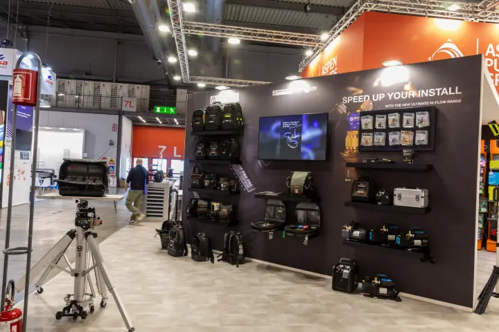 Javac vacuum pumps and Veto Pro Pac tool bags on a black wall at MCE 2026