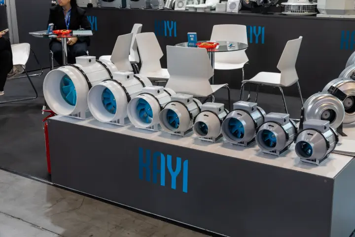 Kayi inline duct fans with blue impellers lined up on a dark plinth at MCE 2026