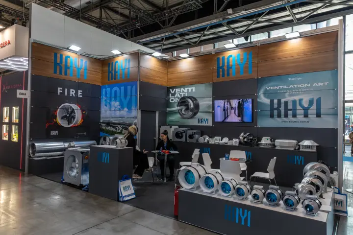 Kayi stand with inline duct fans and wood-panelled upper walls at MCE 2026